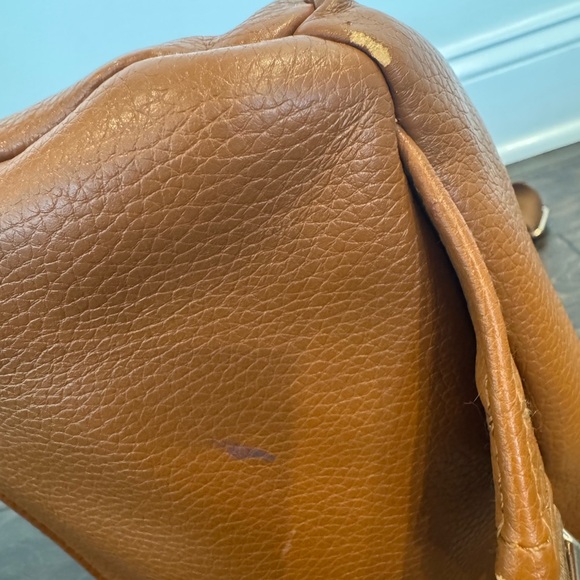Fawn Design “The Original Diaper Bag” backpack in camel leather w/gold hardware